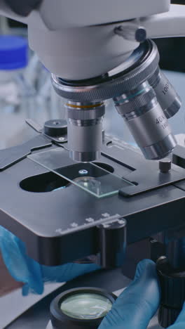 microscope in use in a lab setting