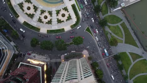 top down drone perspective above tran hung dao statue by river, ho chi minh city