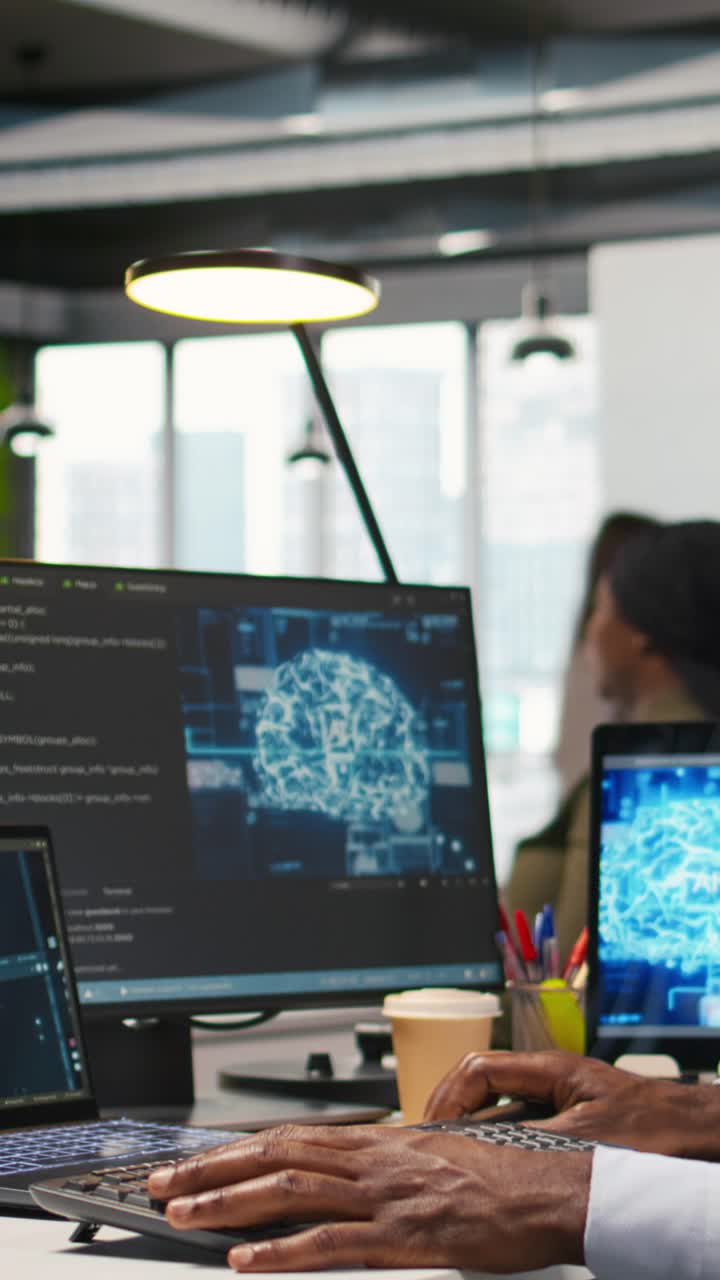 Vertical video Computer scientist in office integrating AI machine learning systems