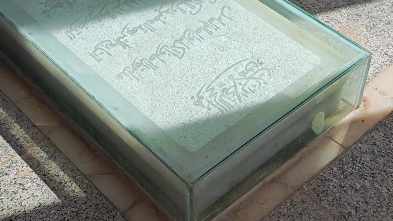 Close-up of an Ancient Stone Grave Marker with Arabic Inscription
