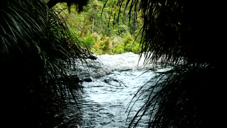 Crystal-clear-water-gracefully-flows-towards-the-majestic-Bridal-Veil-Falls,-creating-a-serene-and-captivating-natural-spectacle