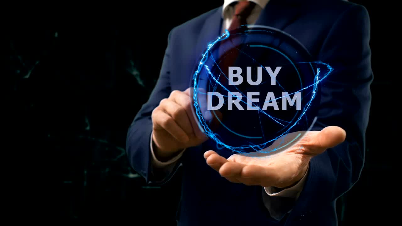 사업가는 그의 손에 콘셉트 홀로그램 구매 꿈을 보여줍니다.