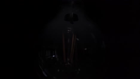 the finger touches the lamp to turn on the light and the idea becomes clear. eureka.