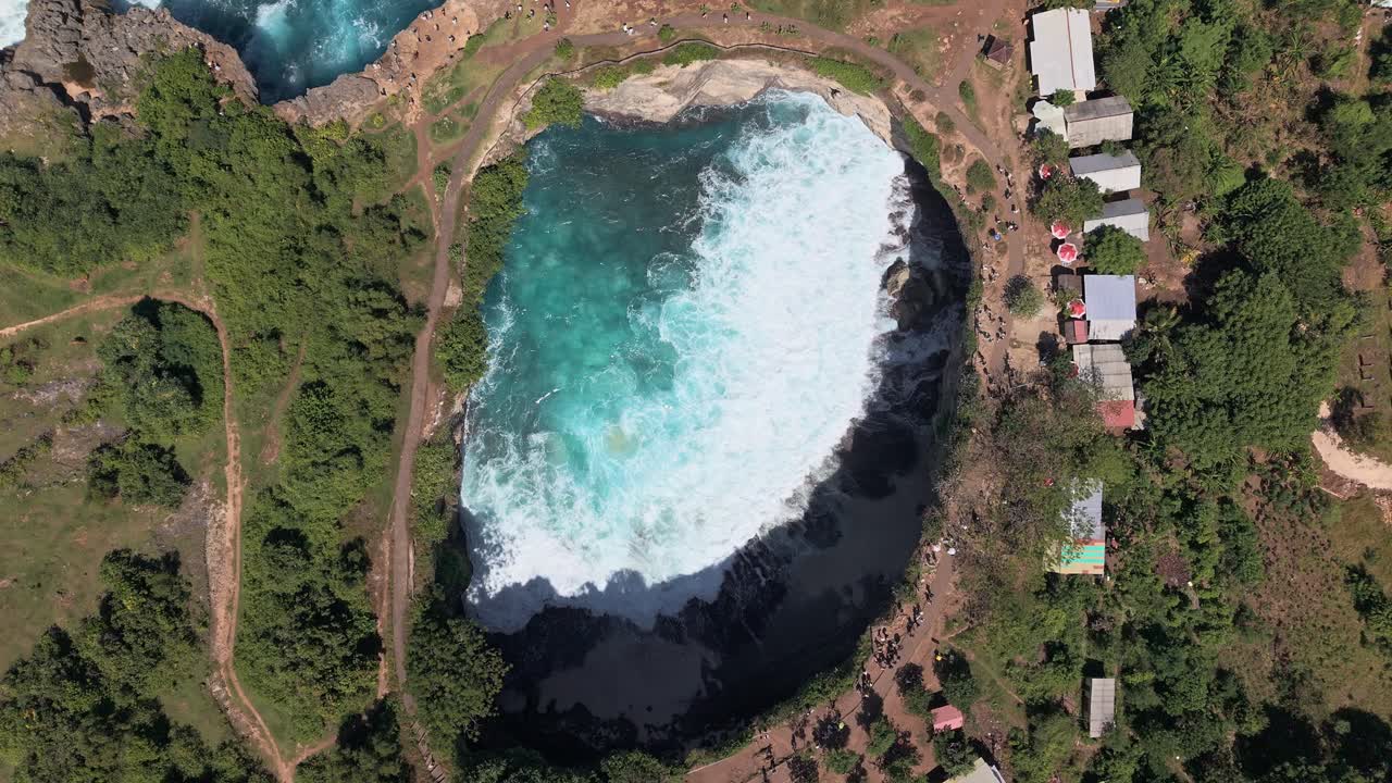 Aerial drone view of waves breaking inside Broken Beach (Pasih Uug), Nusa Penida