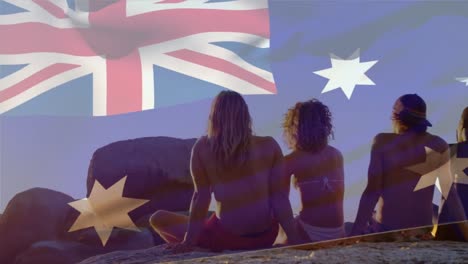 Animation-of-flag-of-australia-over-diverse-group-of-friends-at-beach