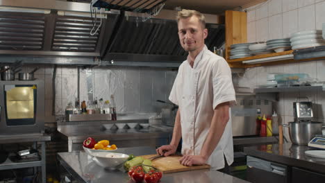 portrait of successful chef in kitchen