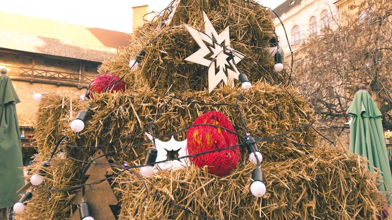 Christmas composition of hay and garlands.