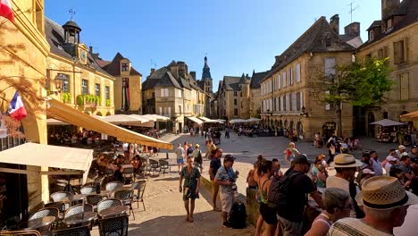 crowded street scene in historic french town