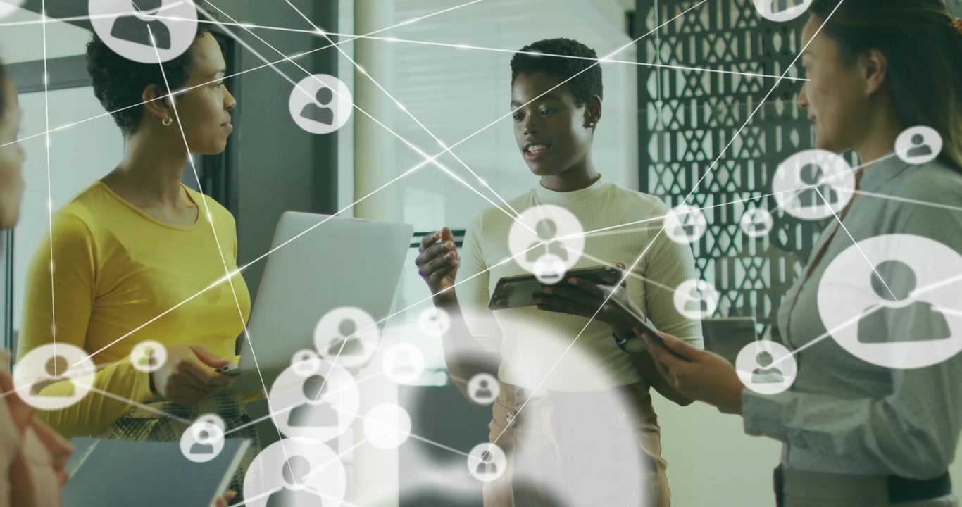 Diverse Business Team Collaborating in Modern Office with Digital Network Overlay