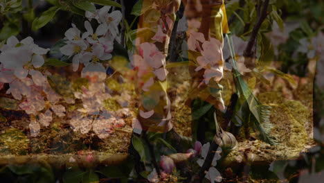 animation of autumn leaves over legs of people in park