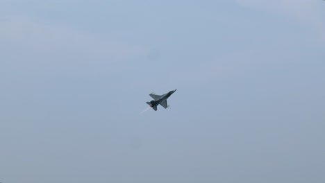 f-16 fighting falcon jet fighter steep takeoff with afterburner track