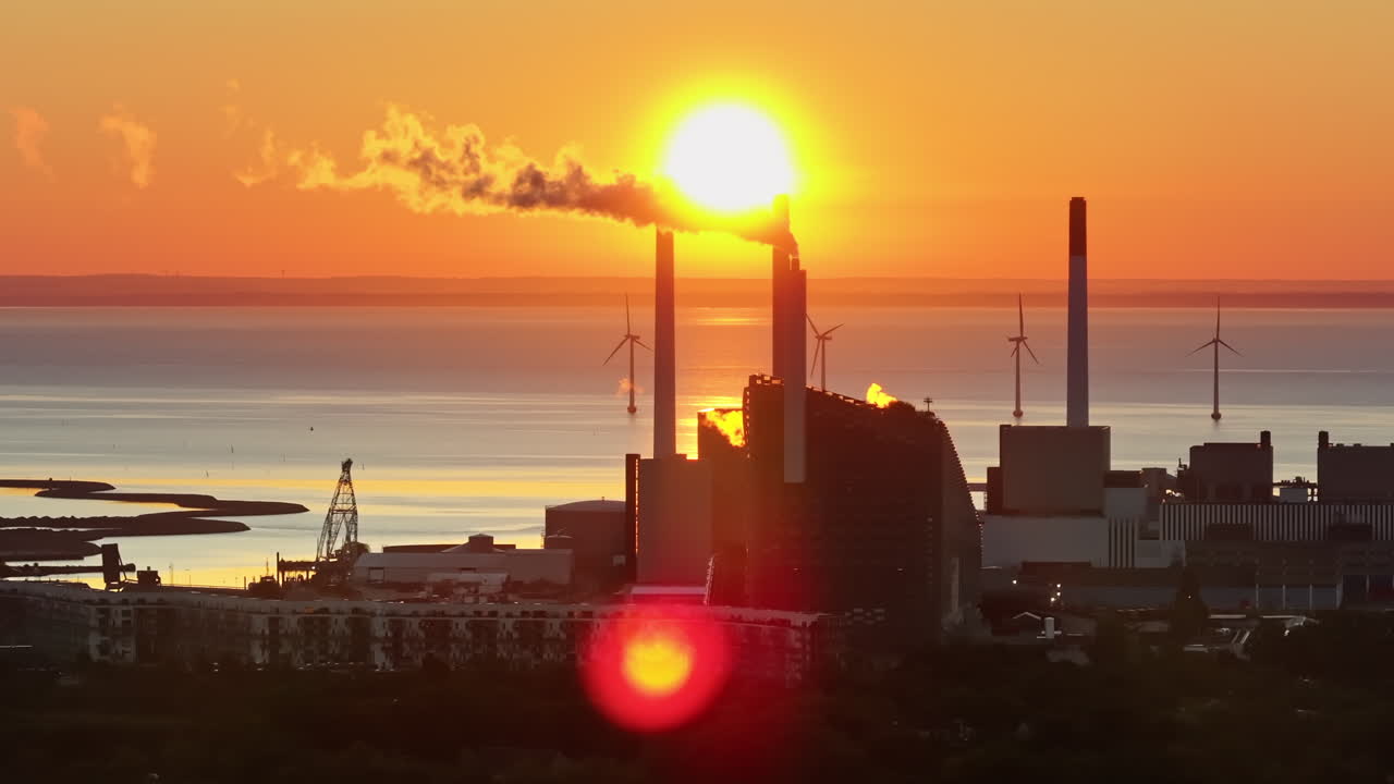 Copenhagen, Denmark - July 24, 2024: Aerial drone view of Amager Bakke in Amager at sunset
