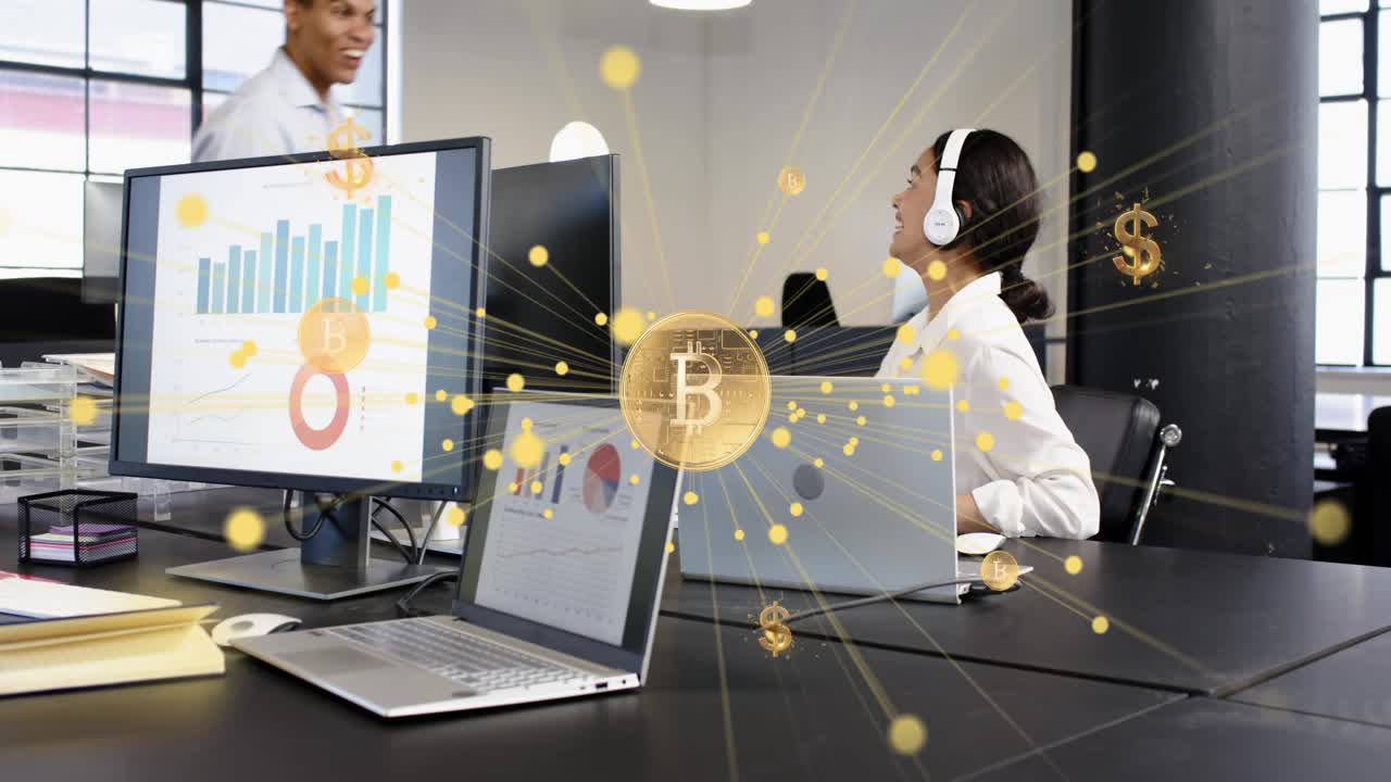 Two colleagues pointing and watching charts, data causing gold sparks forming BTC icon both smiling