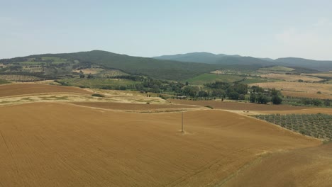 aerial images of tuscany in italy cultivated fields summer