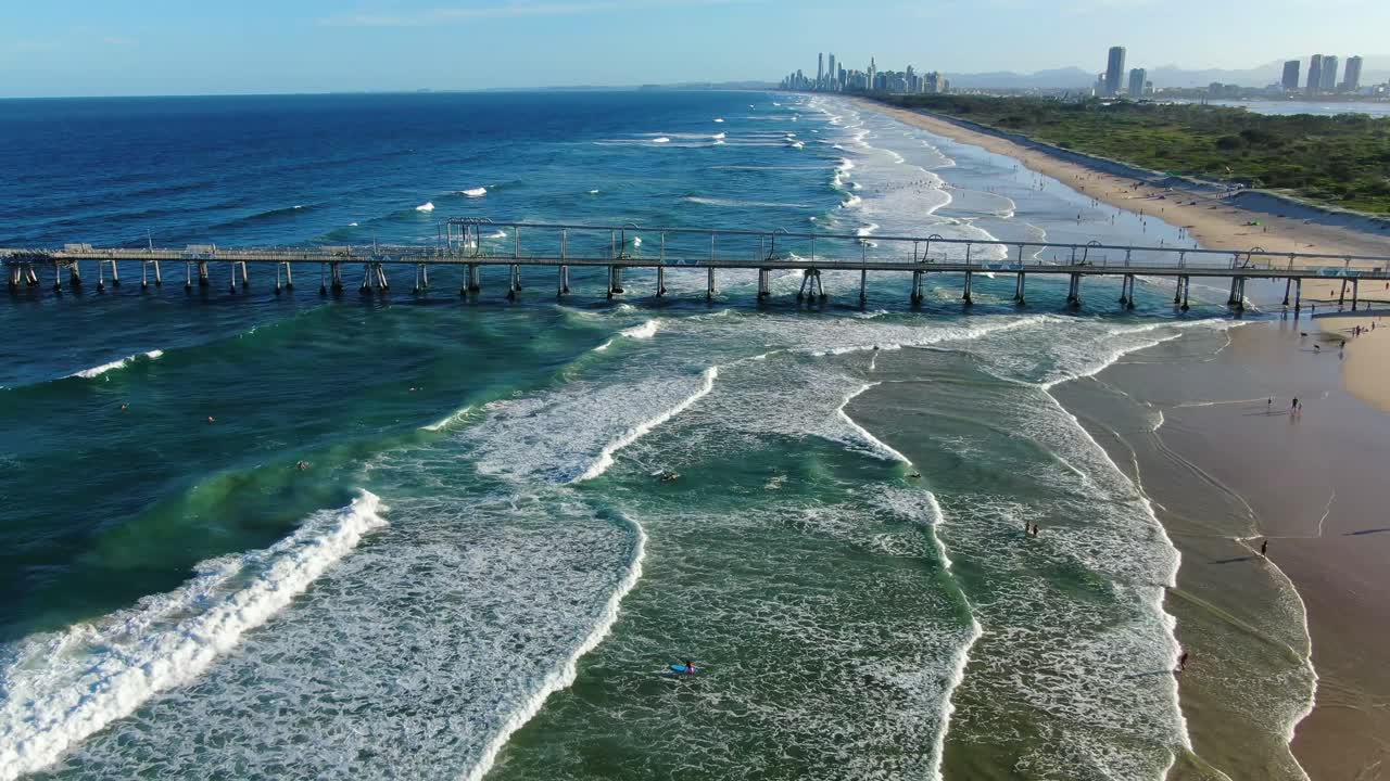 Flying over sand pumping jetty, Surfers Paradise from Gold coast Seaway Sunset