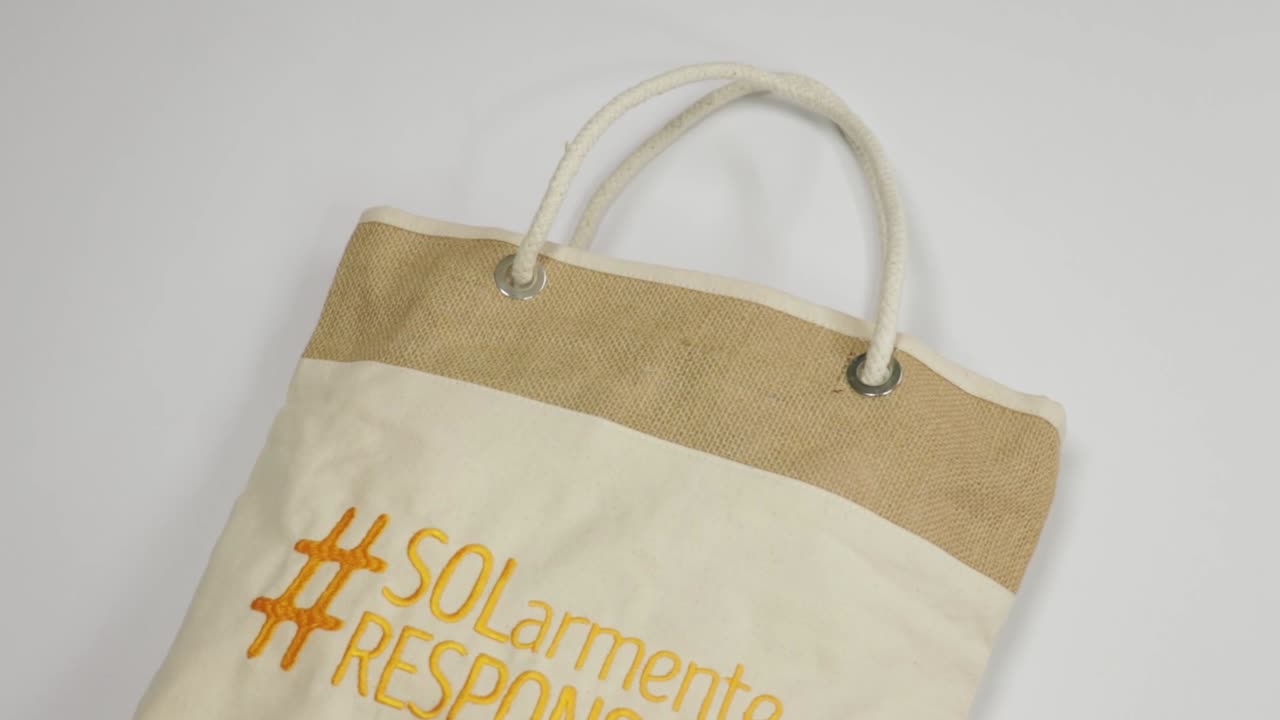 Handmade tote bag advocating for responsible sun tanning