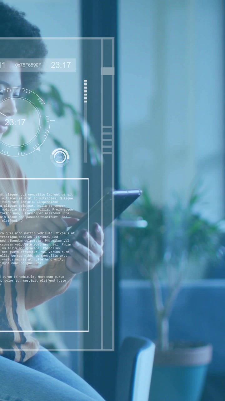 Vertical video: Holographic UI appearing over tablet, man tapping stylus and reviewing tech gauges