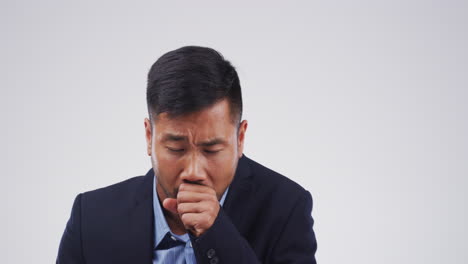 man coughing