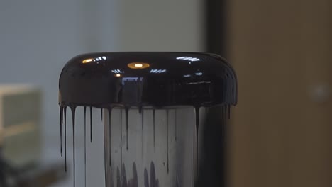 surplus of delicious doughnut chocolate topping drains down