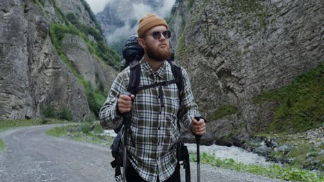 man hiking in mountains