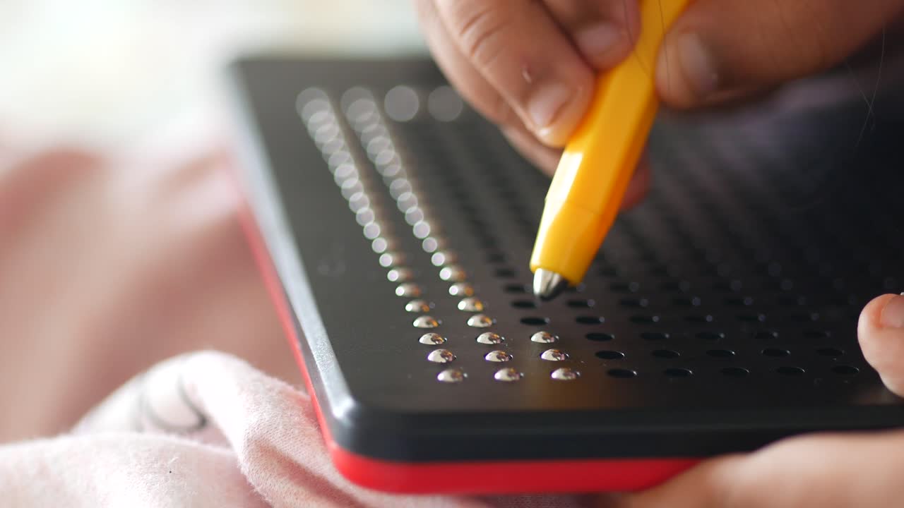 Close up of a magnetic drawing board