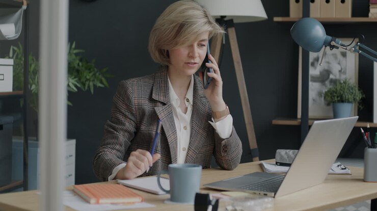 Businesswoman on phone in office