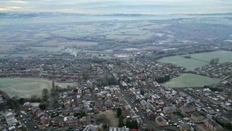 cinematic aerial drone footage of a cold winter scene in the uk