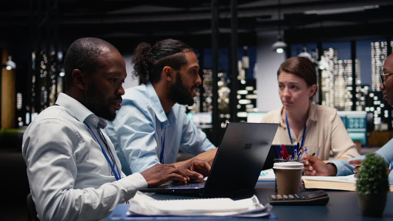 Business manager leading multiracial team, fostering teamwork