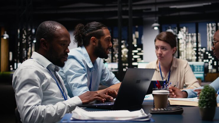Business manager leading multiracial team, fostering teamwork