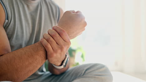 home, closeup and man with wrist pain