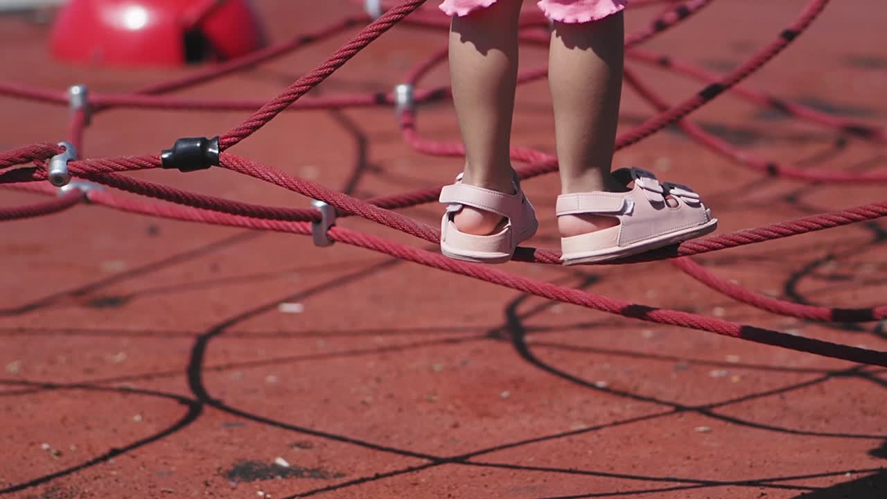 Child on a rope playground