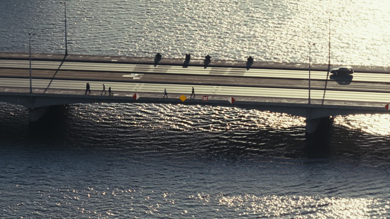 City Bridge Over River with People Walking
