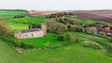 aerial drone footage of a small lincolnshire village called burwell in the uk