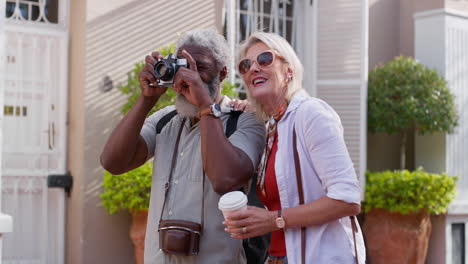 couple of tourists sightseeing and taking photos