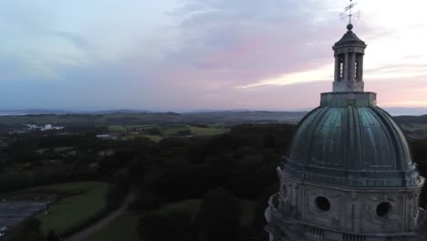 historic ashton memorial english domed folly landmark tower lancashire countryside sunrise aerial pan right view