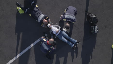 emergency, injury and aerial of people on road