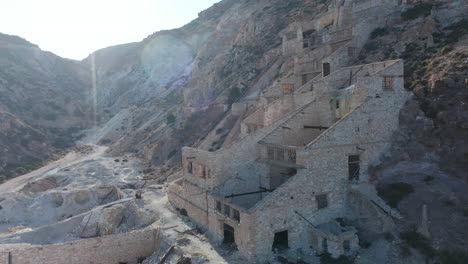 Aerial-View-of-an-Old-Abandoned-Sulphur-Mine-on-Milos-Island,-Greece-at-Sunset