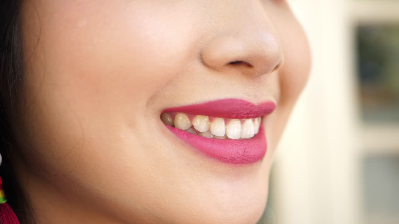 Woman Smiling with Red Lipstick