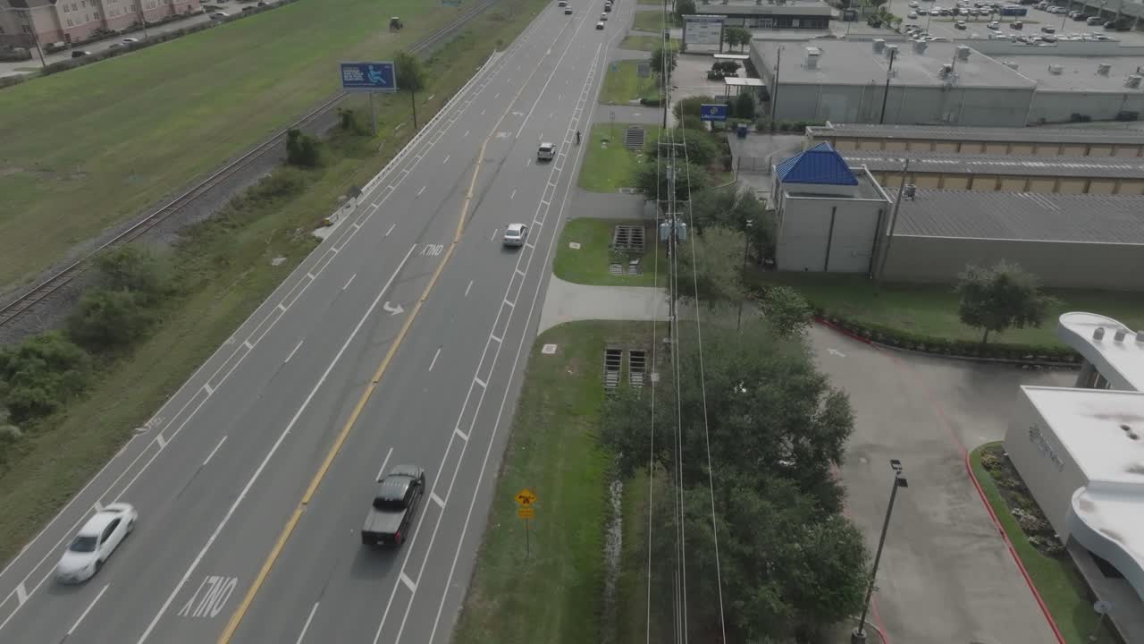 Aerial View of a Busy Road with Surrounding Businesses