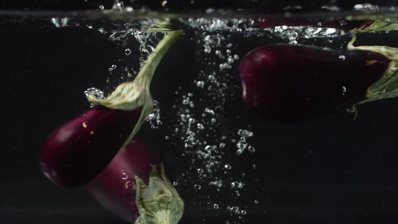eggplant falling into the water
