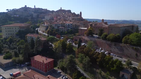 Dramatic-aerial-top-view-flight-Montepulciano-Tuscany-Medieval-mountain-village