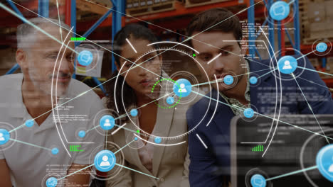 Animation-of-circles,-data,-icons-connected-by-lines,-multiracial-coworkers-discussing-over-laptop