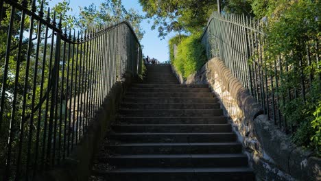 couple at top of steep steps