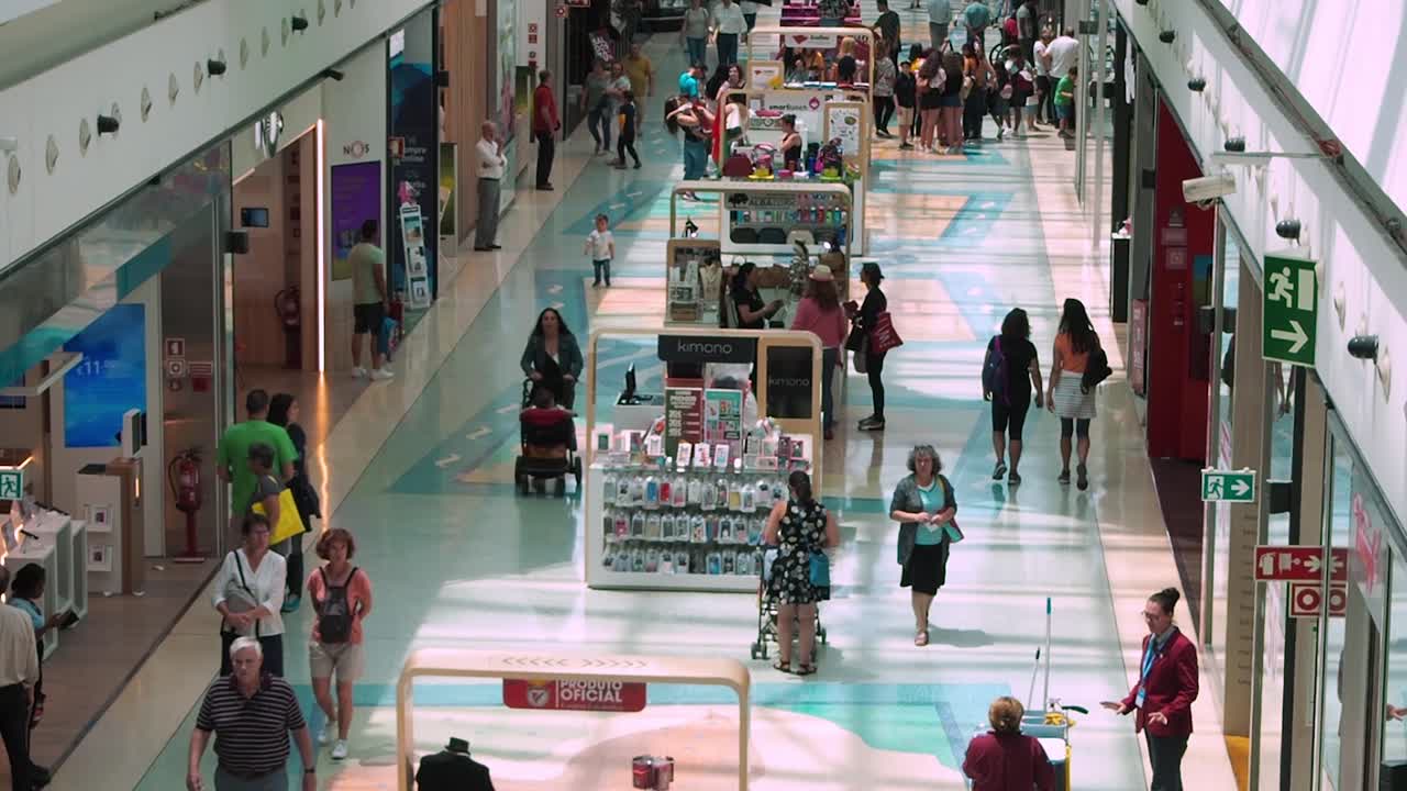 People Crowd Looking For Sales In Vasco da Gama Shopping Center Mall.