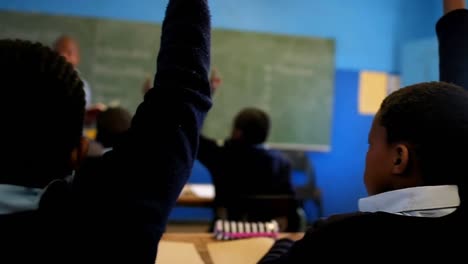 schoolkids studying in the classroom 4k