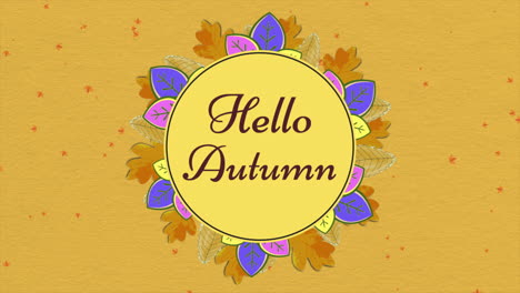 Hello-Autumn-with-maple-autumn-leafs-on-yellow-paper