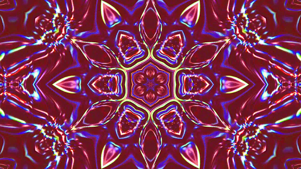 Motif kaléidoscopique abstrait aux couleurs rouges. Mandala magique. 4K.