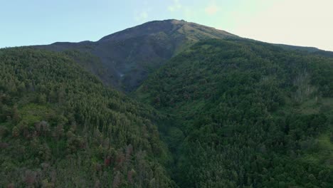 Aerial-view-of-Sumbing-Mountain-with-green-forest-on-the-slope