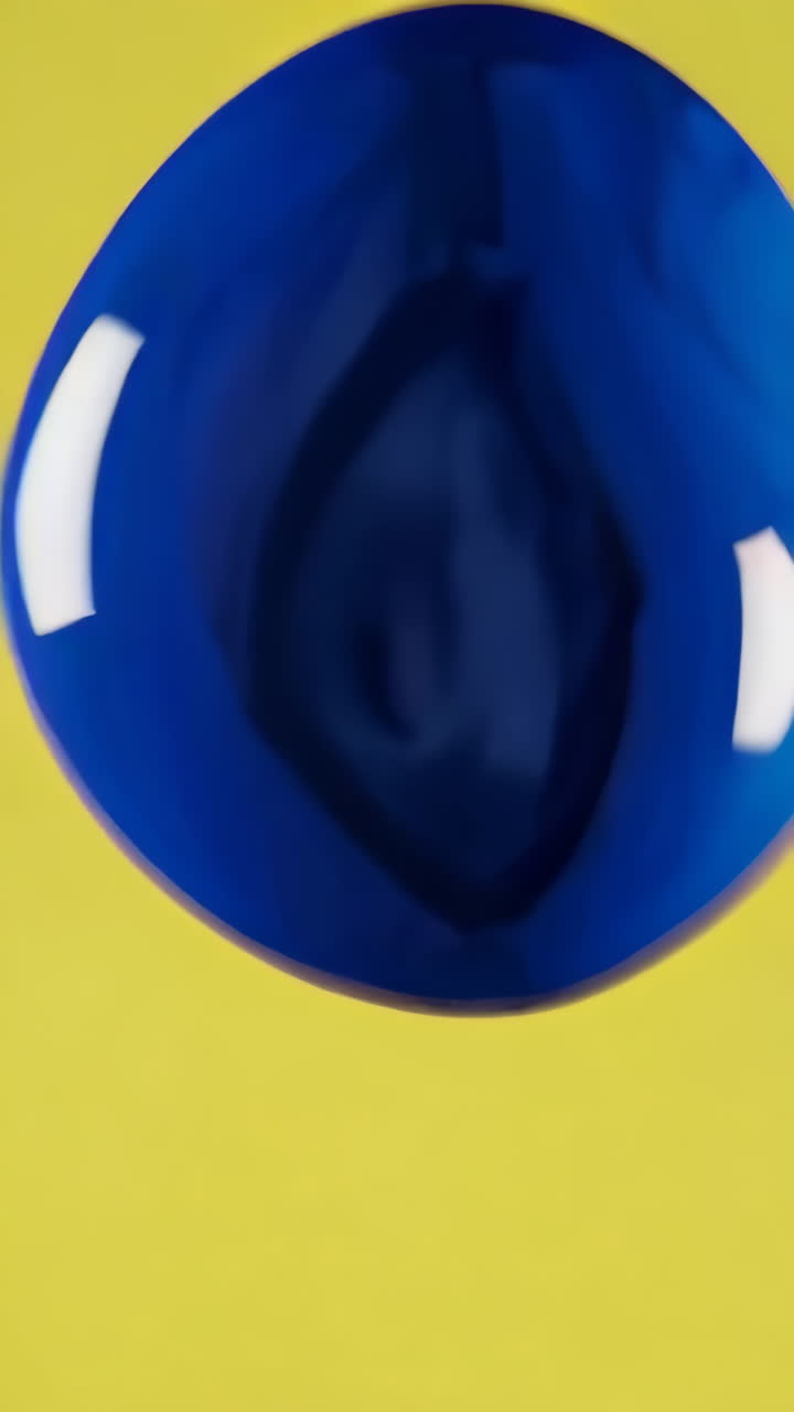 Blue Liquid Abstract Forms on Yellow Background