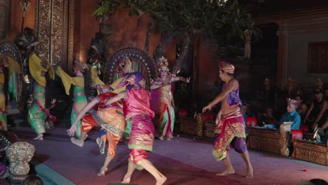 group of women performers dancing legong and ramayana traditional theater dance performance at ubud palace, bali
